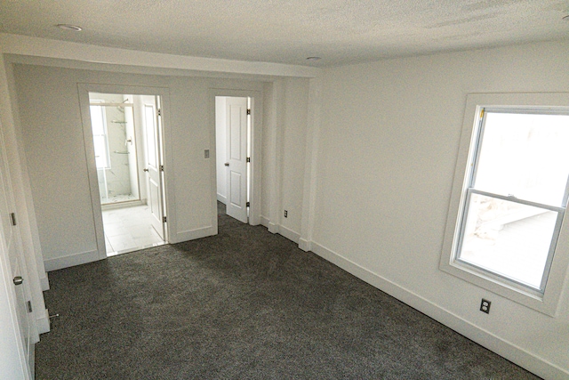 2552 N La Salle Gdns, Detroit, MI 48206 - unfurnished room featuring baseboards and dark carpet