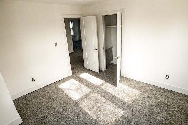 2552 N La Salle Gdns, Detroit, MI 48206 - unfurnished bedroom with a closet, baseboards, and carpet