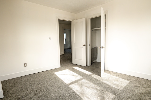 2552 N La Salle Gdns, Detroit, MI 48206 - unfurnished bedroom featuring baseboards, carpet floors, and a closet