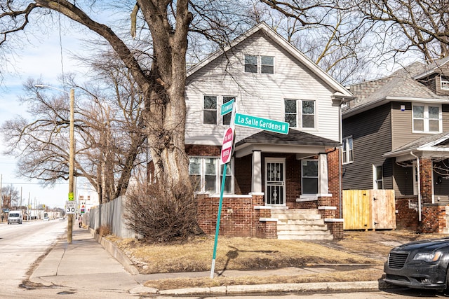 2552 N La Salle Gdns, Detroit, MI 48206 - american foursquare style home with brick siding and fence