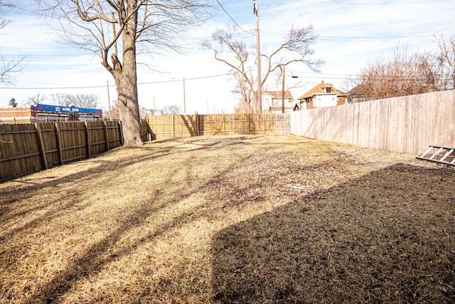 view of yard featuring a fenced backyard