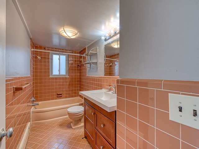 bathroom featuring tile walls, toilet, shower / bathing tub combination, and tile patterned floors