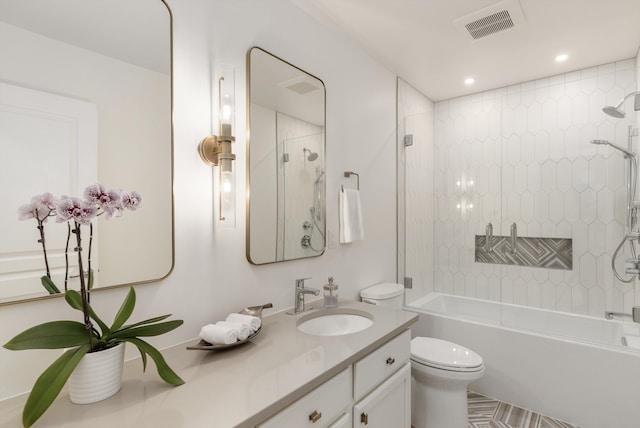 bathroom with vanity, visible vents, recessed lighting, tub / shower combination, and toilet