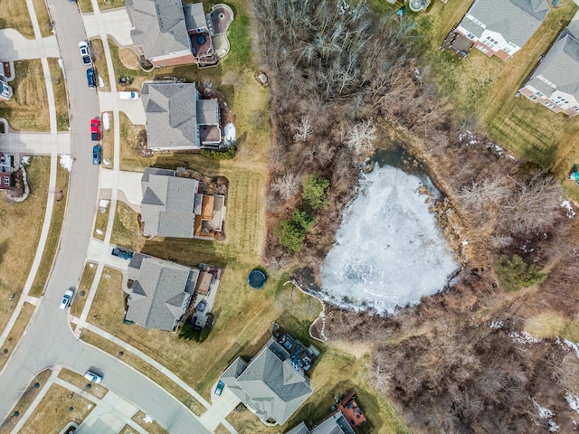 birds eye view of property with a residential view