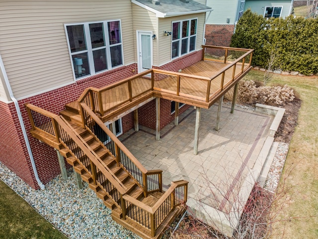 deck with a patio area and stairway