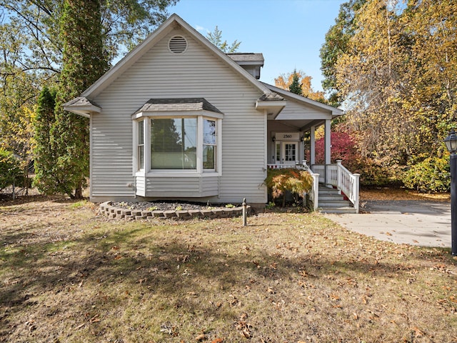 bungalow-style house featuring covered porch