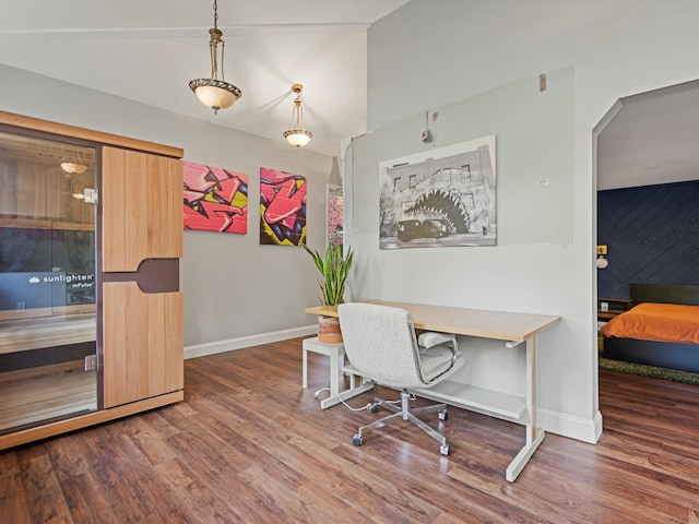 home office with wood finished floors and baseboards