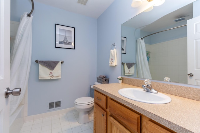 bathroom with visible vents, toilet, vanity, and tile patterned flooring