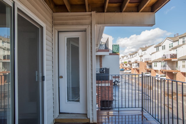 balcony featuring a residential view