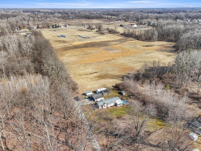 birds eye view of property with a rural view