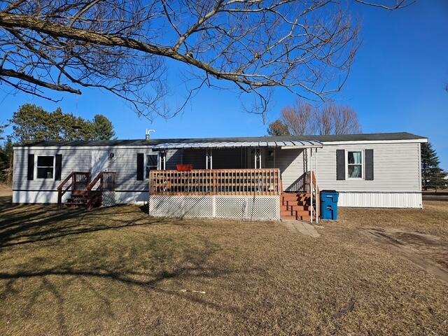 260 N Perry St, Barryton, MI 49305 - manufactured / mobile home with a front yard