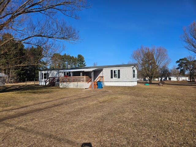 260 N Perry St, Barryton, MI 49305 - manufactured / mobile home with a front yard