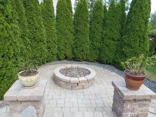 view of patio / terrace with an outdoor fire pit