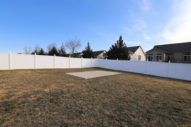 view of yard with a fenced backyard and a patio area