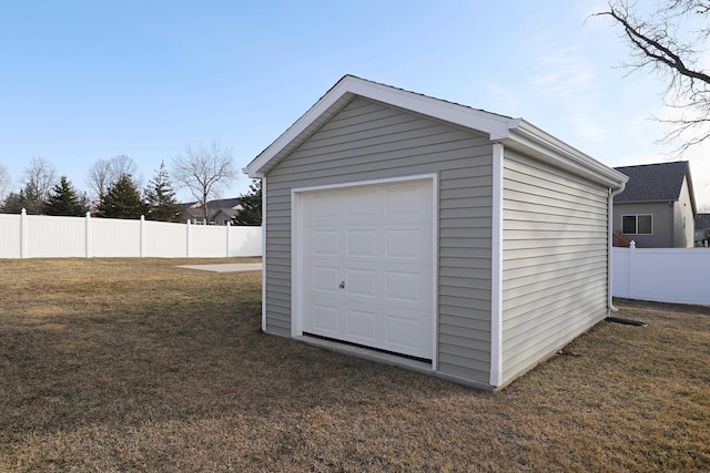 garage with fence