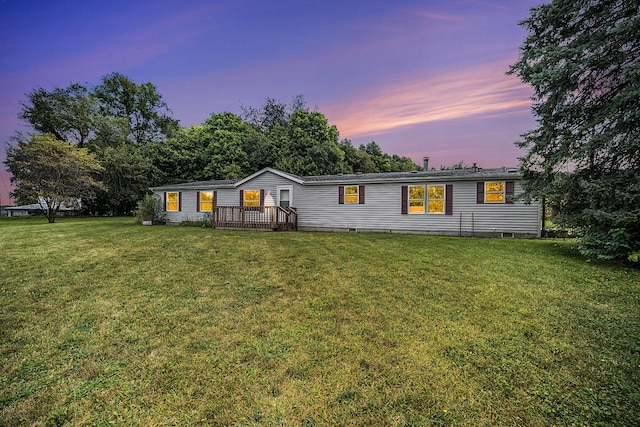 manufactured / mobile home featuring crawl space and a front yard