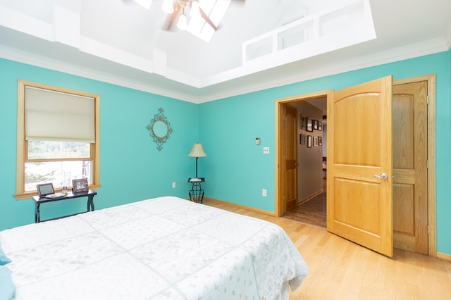 15797 Hillside Dr, Vandalia, MI 49095 - bedroom with light wood-type flooring, crown molding, and baseboards