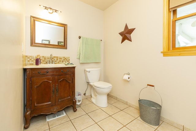 15797 Hillside Dr, Vandalia, MI 49095 - bathroom featuring tile patterned flooring, visible vents, toilet, and vanity