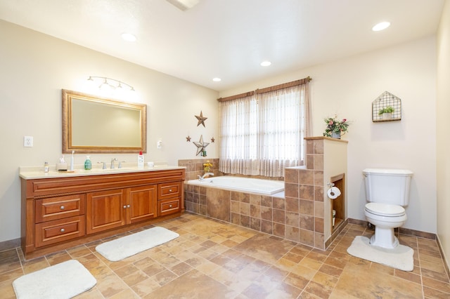 15797 Hillside Dr, Vandalia, MI 49095 - bathroom featuring a bath, recessed lighting, toilet, and vanity