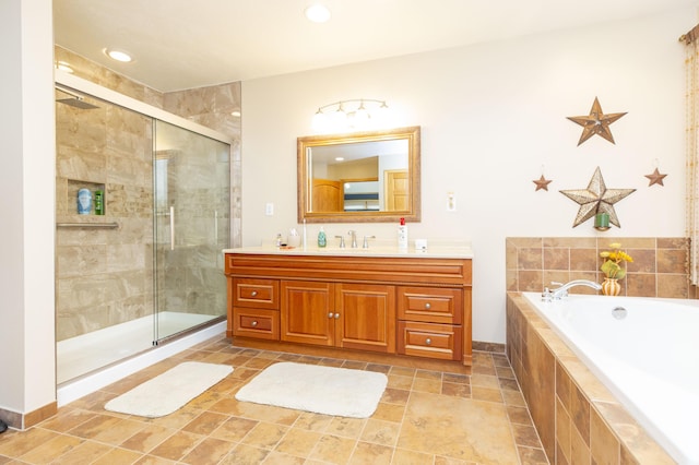15797 Hillside Dr, Vandalia, MI 49095 - full bathroom with recessed lighting, a stall shower, vanity, and a bath