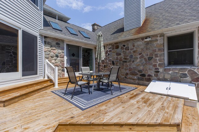 15797 Hillside Dr, Vandalia, MI 49095 - wooden deck with outdoor dining space