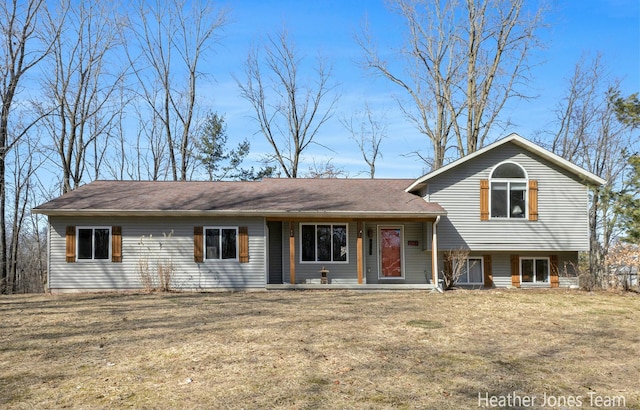 tri-level home featuring a front yard