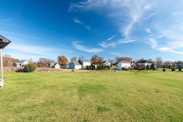 view of yard featuring a residential view