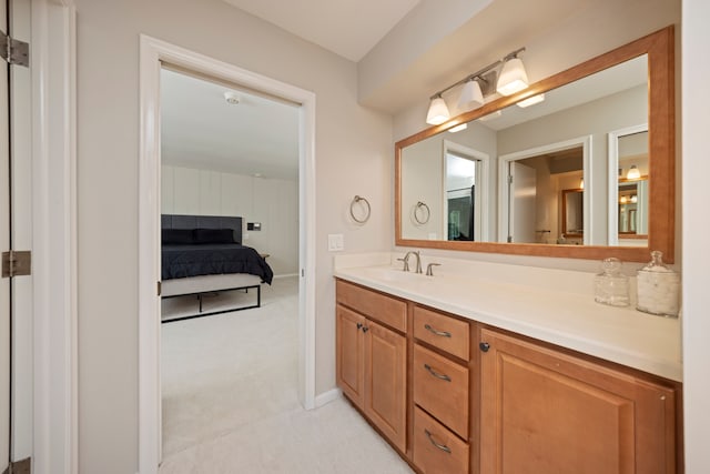 bathroom featuring vanity and baseboards