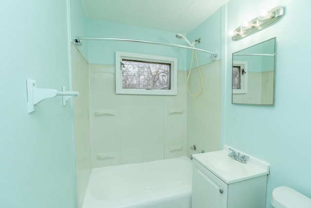 bathroom featuring shower / bath combination, toilet, and vanity