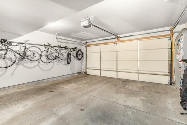 garage with bike storage and a garage door opener