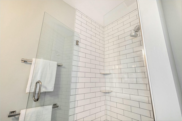 bathroom featuring a stall shower