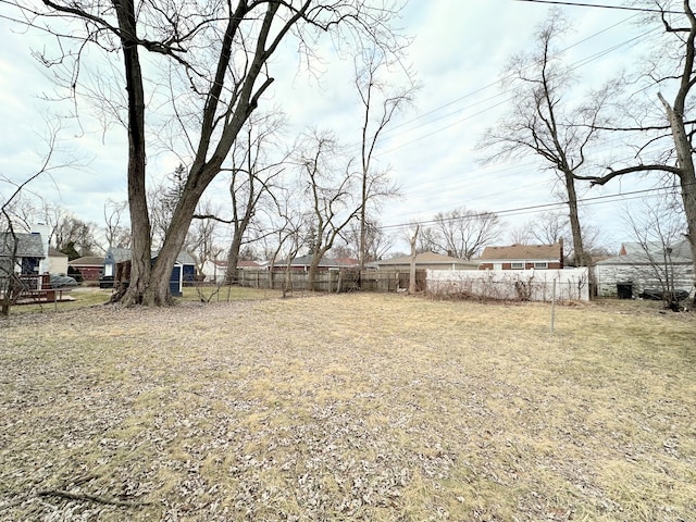 view of yard with fence