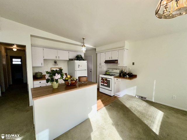 kitchen with visible vents, wooden counters, under cabinet range hood, white cabinets, and white appliances