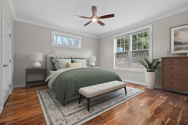 bedroom with a ceiling fan, dark wood-style floors, baseboards, and ornamental molding