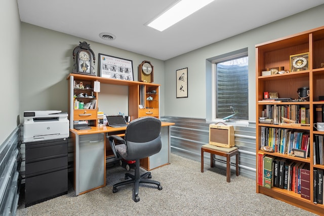 office space with carpet and visible vents