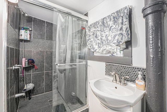 full bathroom featuring vanity and a shower stall