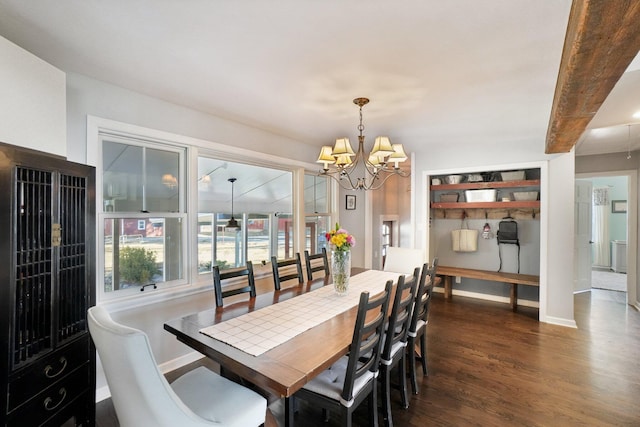 dining space with a notable chandelier, baseboards, and dark wood-style flooring