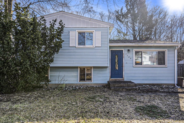 tri-level home featuring entry steps