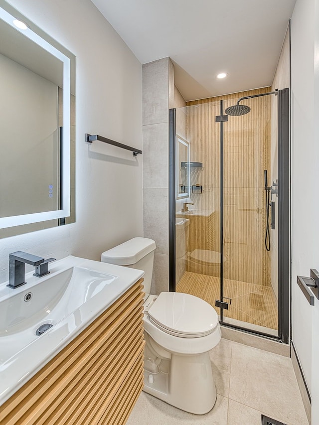 full bath featuring toilet, recessed lighting, a stall shower, tile patterned floors, and vanity