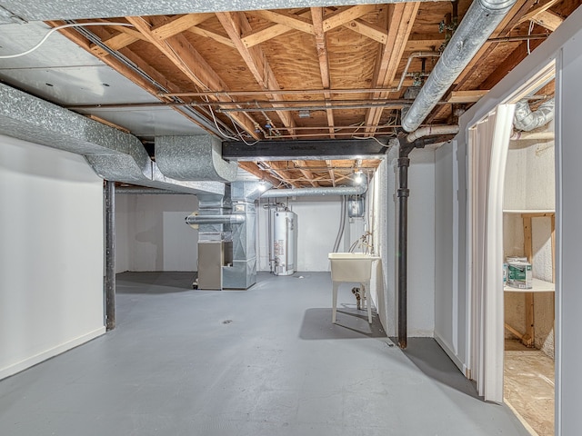 unfinished basement featuring heating unit and water heater