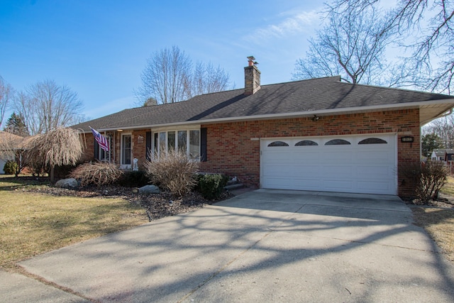 single story home with driveway, a chimney, a shingled roof, a garage, and brick siding