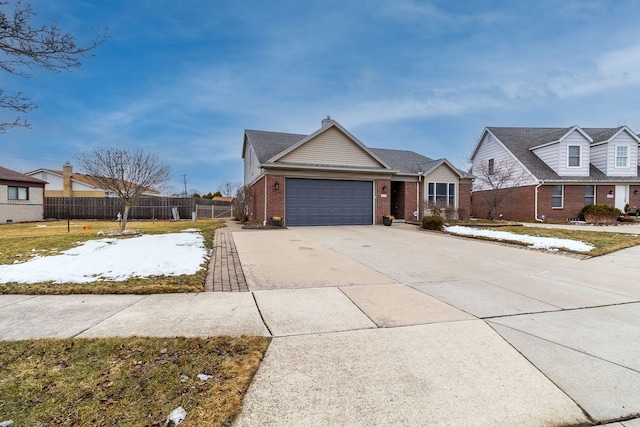 view of front of house featuring brick siding, fence, concrete driveway, a chimney, and a garage