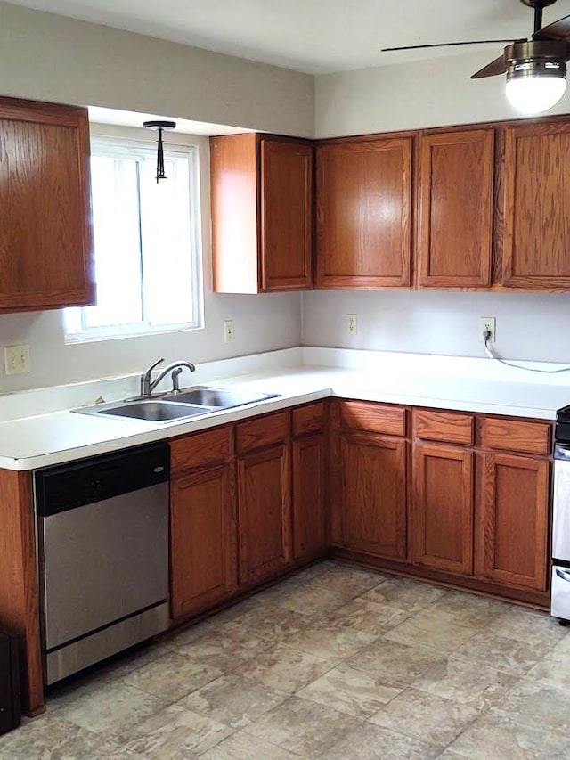 21641 Jacksonville St, Farmington Hills, MI 48336 - kitchen with brown cabinetry, a sink, light countertops, and stainless steel dishwasher