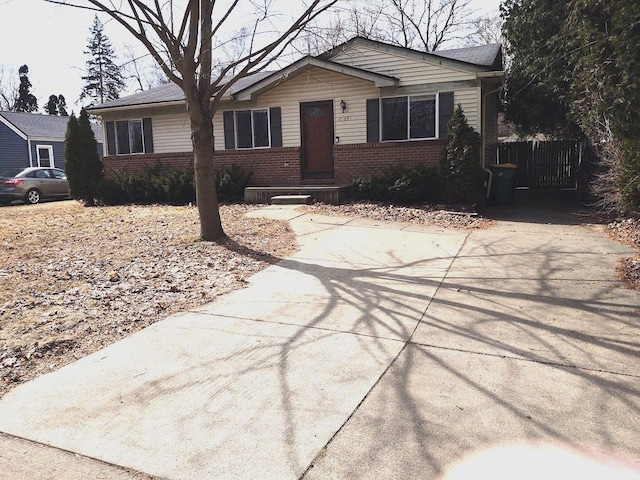 single story home with brick siding