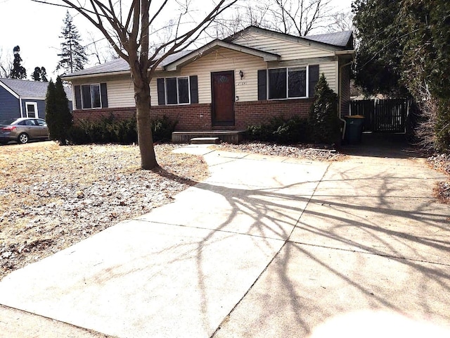 view of front of house with brick siding