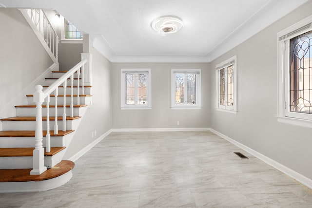 interior space featuring visible vents, stairs, and baseboards