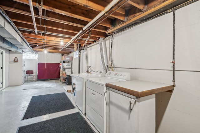 basement with separate washer and dryer