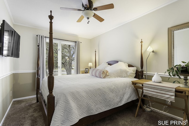 carpeted bedroom with ceiling fan, baseboards, and ornamental molding