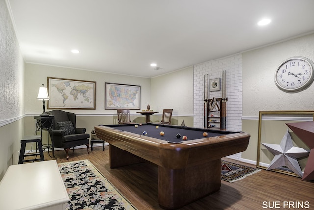 rec room with pool table, recessed lighting, wood finished floors, and ornamental molding