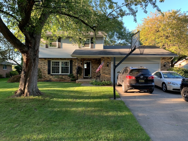 view of front facade with driveway, brick siding, an attached garage, and a front yard